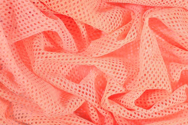 Orange crumpled nonwoven fabric background — Stock Photo, Image