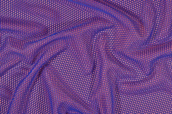 Blu tessuto non tessuto spiegazzato su un arancione — Foto Stock