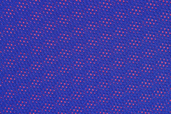 Blue nonwoven fabric on a red — Stock Photo, Image