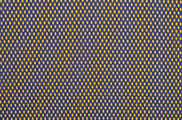 Blue nonwoven fabric on a yellow — Stock Photo, Image