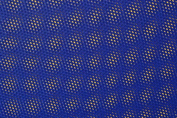 Blue nonwoven fabric on a yellow — Stock Photo, Image