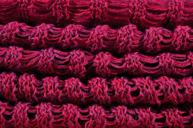 Kırmızı melanj ajur örgü kumaş yığınını