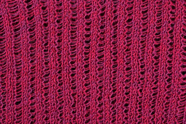 Dark red openwork stockinet as backgroun — Stock Photo, Image