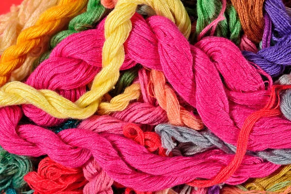 Colorful embroidery floss background — Stock Photo, Image