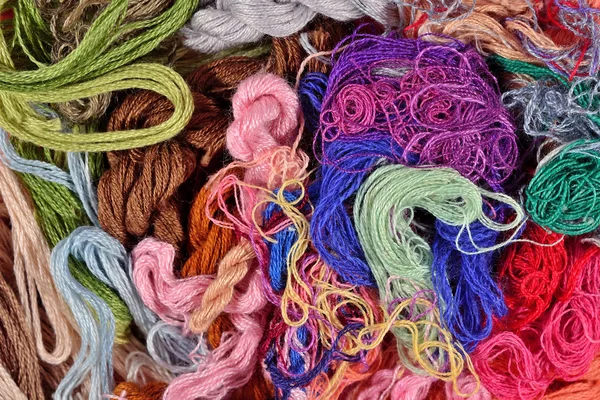 Colorful embroidery floss background — Stock Photo, Image