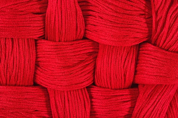 Red embroidery floss  background — Stock Photo, Image