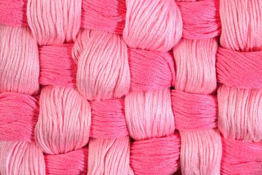 Pembe bükülmüş skeins ipi arka plan doku olarak