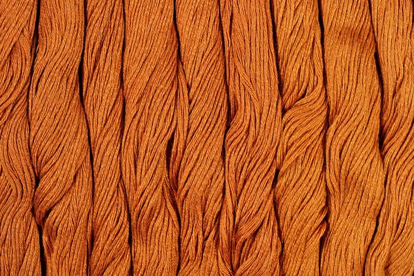 Brązowy motkach nici jako tekstura tło — Zdjęcie stockowe