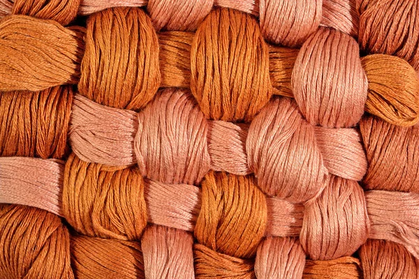 Brown twisted skeins of floss as background texture — Stock Photo, Image