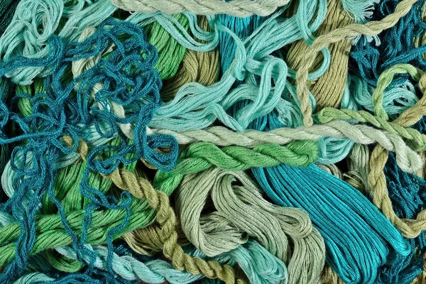 Colorful embroidery floss as background texture — Stock Photo, Image