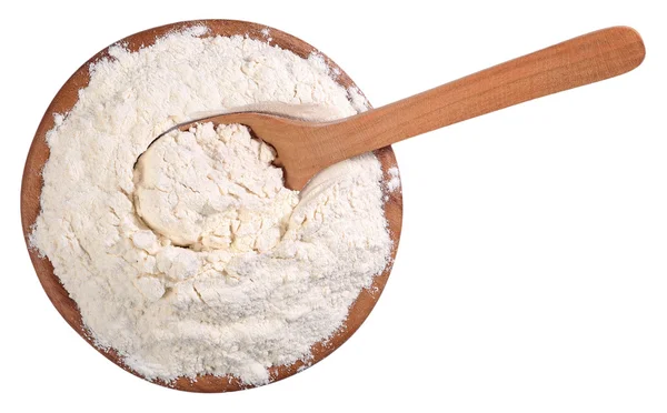 Top view of white flour in a wooden bowl with spoon on a white — Stock Photo, Image