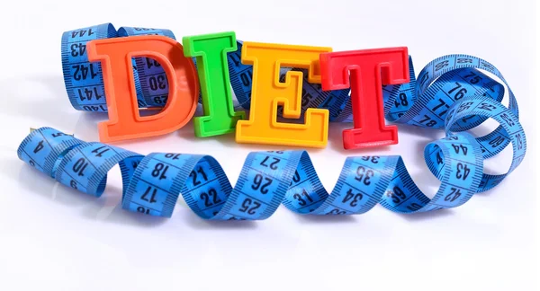 Word Dieta escrita con letras coloridas con cinta métrica azul o —  Fotos de Stock