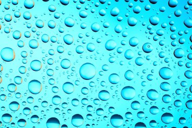 Mavi Arkaplanda Su Damlaları