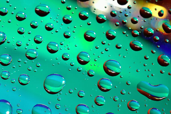 Water drops on colored background