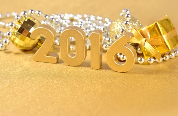 2016 year golden figures and Christmas decorations — Stock Photo, Image