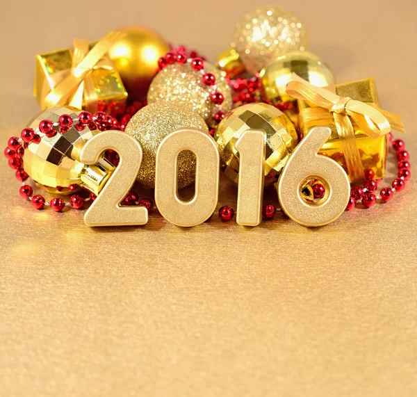 2016 year golden figures and Christmas decorations — Stock Photo, Image