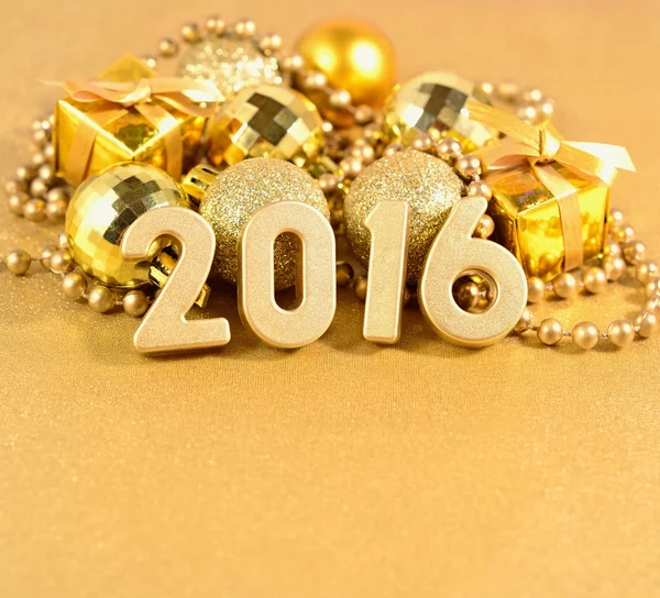 2016 roku zlatý a zlatý vánoční ozdoby — Stock fotografie