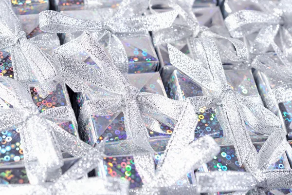 Silver gifts as background — Stock Photo, Image