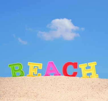 Bir plaj kum Beach harfler