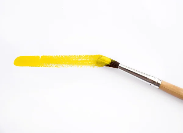 Artist yellow brush and paint scratch — Stock Photo, Image