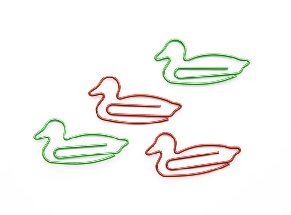 Paper clips made in form of duck on white background — Stock Photo, Image