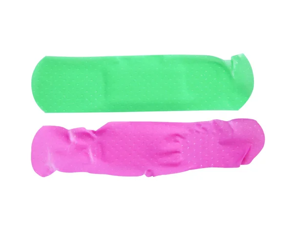 Colored adhesive bandage plaster close up macro , isolated on white background (clipping path) — Stock Photo, Image
