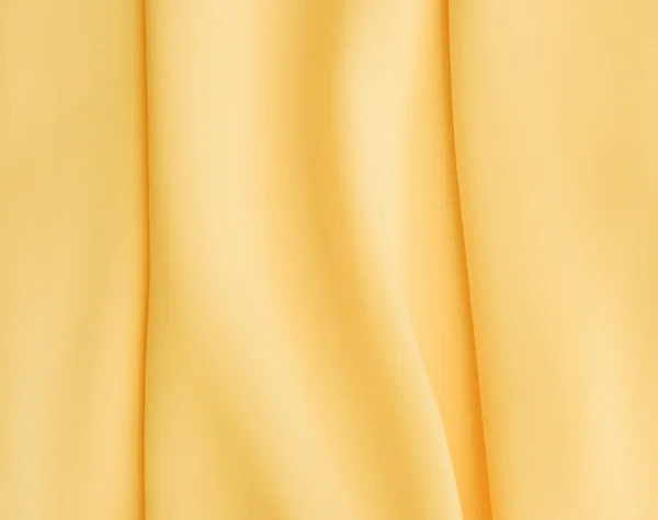 Yellow silk texture of satin abstract background. — Stock Photo, Image