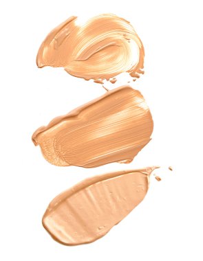 sıvı toz vuruş beyaz arka plan üzerinde çeşitli makyaj koleksiyonu