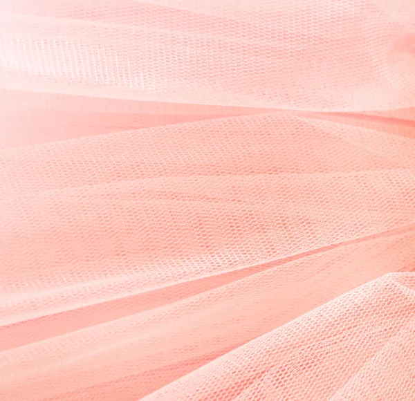 Vackra lager av delikat rosa tyg bakgrund. — Stockfoto