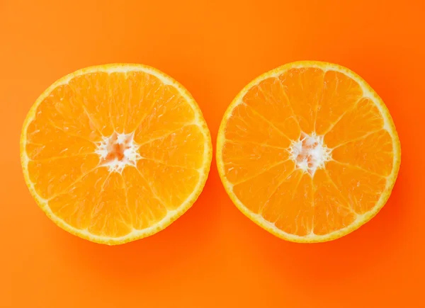 Slices Orange on orange color background. — Stock Photo, Image