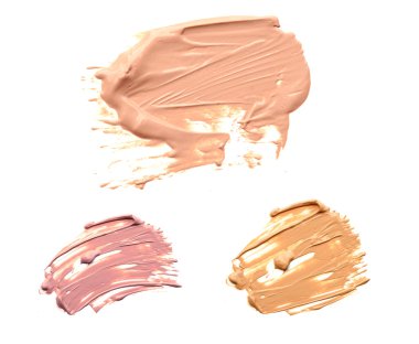 sıvı toz vuruş beyaz arka plan üzerinde çeşitli makyaj koleksiyonu