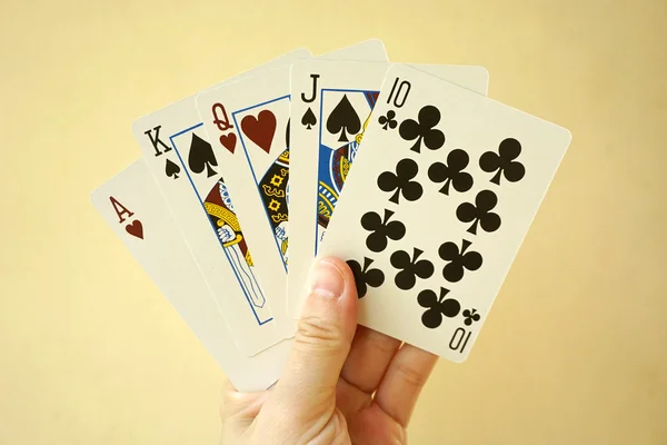 Hand with playing cards — Stock Photo, Image