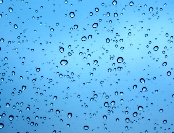 Agua azul gotas fondo — Foto de Stock