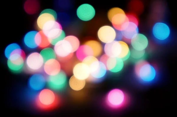 Kleurrijke achtergrond met gedefocuste lichten — Stockfoto