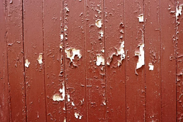 Pared de madera vieja pintada. fondo rojo — Foto de Stock