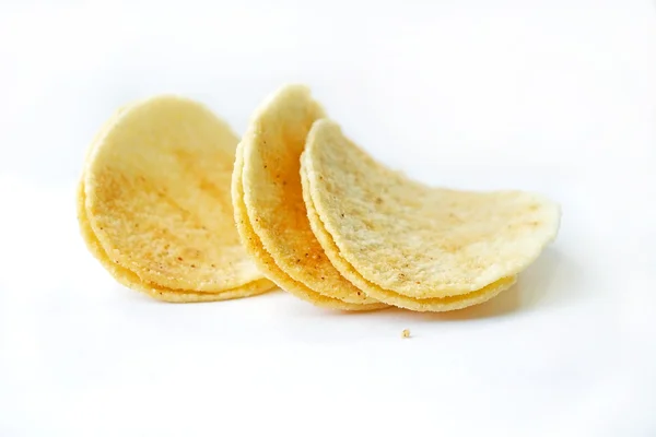 Potato chips on a white background. — Stock Photo, Image