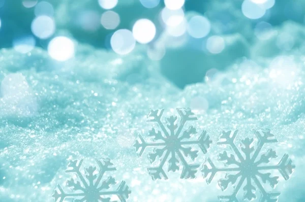 Ice crystal on snow in blurred background — Stock Photo, Image