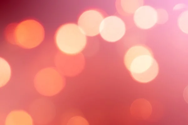 Rood en oranje vakantie bokeh. Abstract Kerst achtergrond — Stockfoto