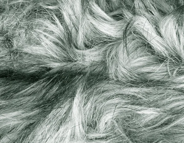 Фрагмент текстуры серого меха как фон — стоковое фото