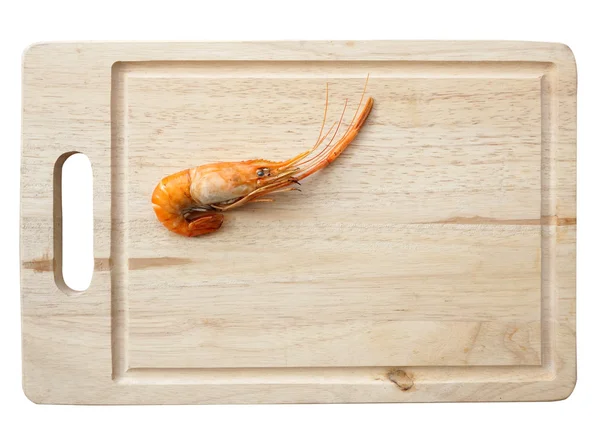Crevettes grillées sur plaque de bois — Photo