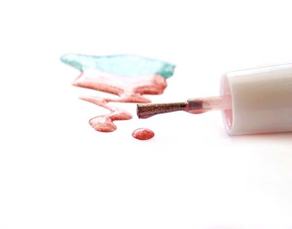 Pink nail polish and brush on white background — Stock Photo, Image