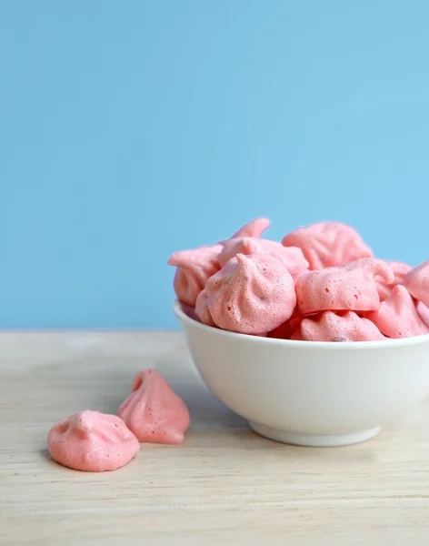 Sweet pink french meringue in white bowl — Stock Photo, Image