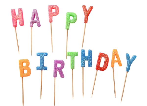 Kleurrijke kaarsen in brieven zeggen Happy Birthday, geïsoleerd op een witte achtergrond (uitknippad) Rechtenvrije Stockfoto's