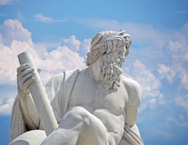 Zeus against blue sky, detail of Italy Rome Navona square four rivers fountain Rome