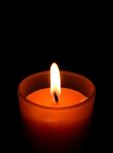 Candle on black background — Stock Photo, Image