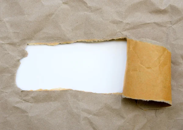 Torn brown paper — Stock Photo, Image