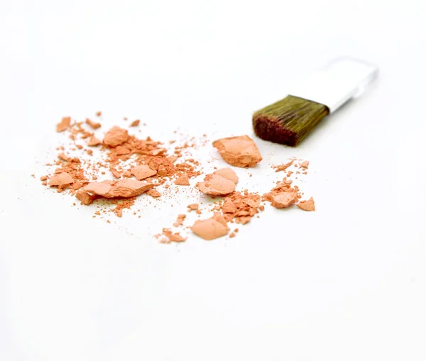 Cosmetic powder brush and crushed blush isolated on white — Stock Photo, Image