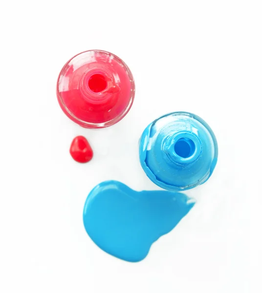 Top view of pink and blue matte nail polish on white background. — Stock Photo, Image