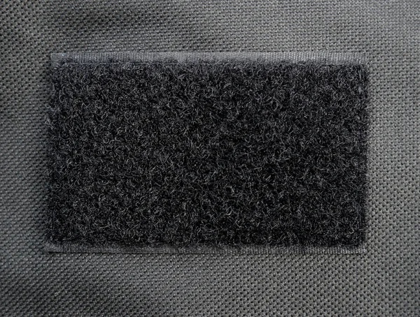 Tejido negro fieltro textura y fondo — Foto de Stock