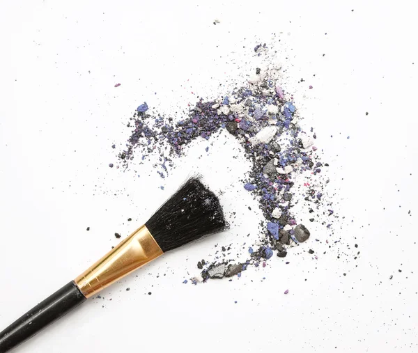 Professional make-up brush on mixed blue crushed eyeshadow — Stock Photo, Image